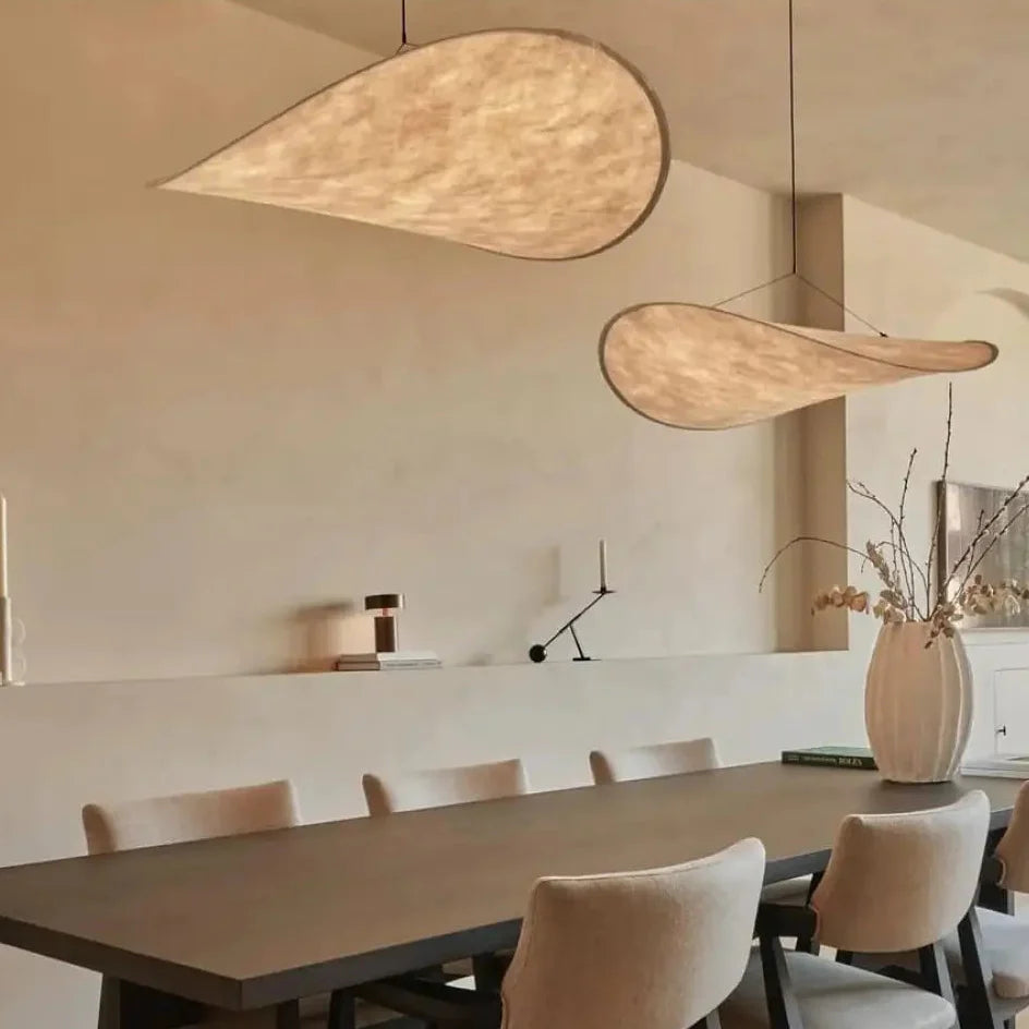 AKARI Pendant Light above dining table – warm neutral light, 80cm fabric shade, minimalist interior