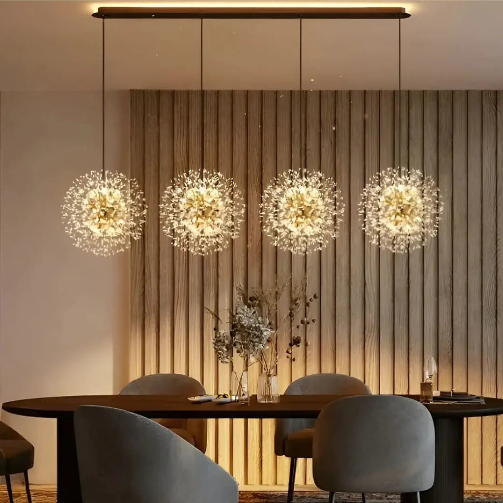 KLOUD Dandelion Pendant Light above dining table – warm G9 glow, gold metal, Art Deco style
