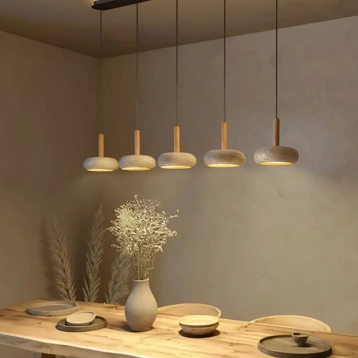 STONE Pendant Light above dining table – cluster installation, Wabi-Sabi aesthetic, LUMA LIGHTS